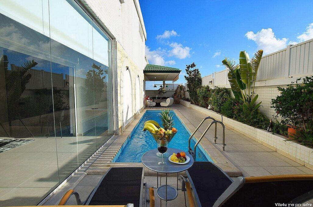 פנטהאוז אנדראה צפון  19  נופש - וי פור ויקיישן - V for Vacation