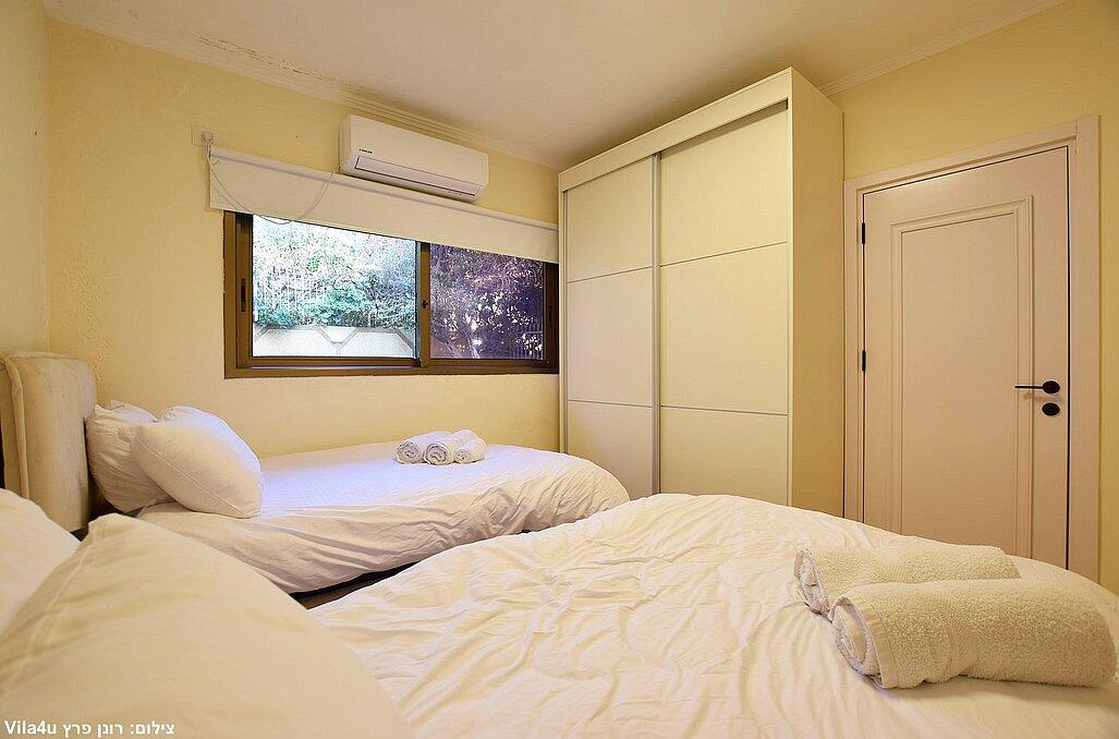 אחוזת הים נתניה מרכז  17  נופש - וי פור ויקיישן - V for Vacation