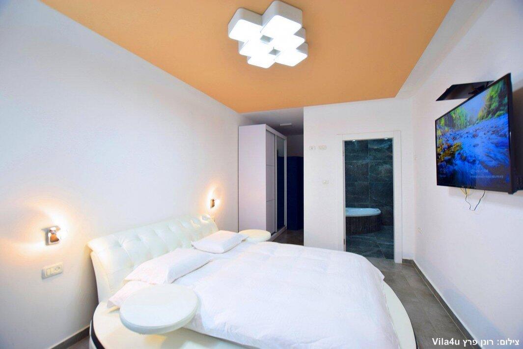 אחוזת הנסיכה וילג מרכז אחוזת הנסיכה וילג - חדר שינה חדר שינה עם חדר רחצה פרטי נופש - וי פור ויקיישן - V for Vacation