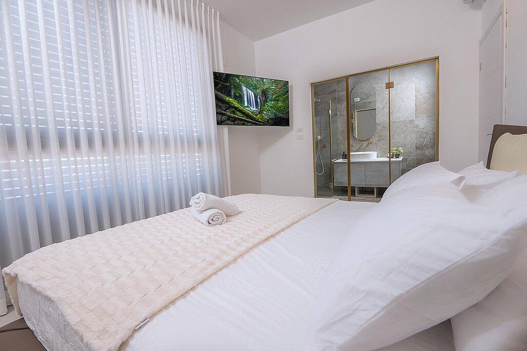 וילה טווינס בוטיק צפון  34  נופש - וי פור ויקיישן - V for Vacation