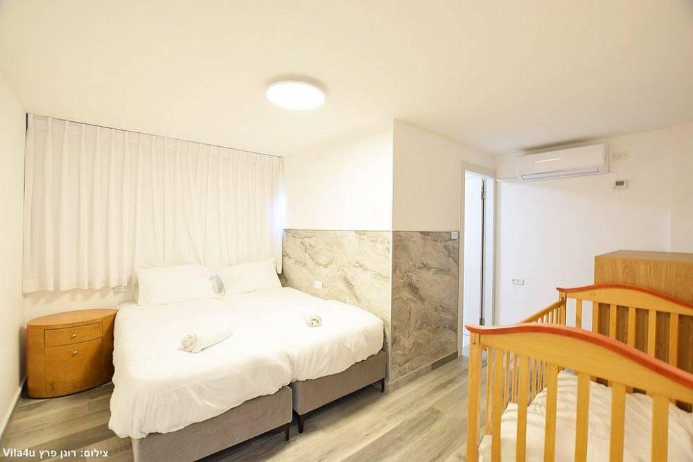 וילה מול הצדיק פקיעין צפון  20  נופש - וי פור ויקיישן - V for Vacation