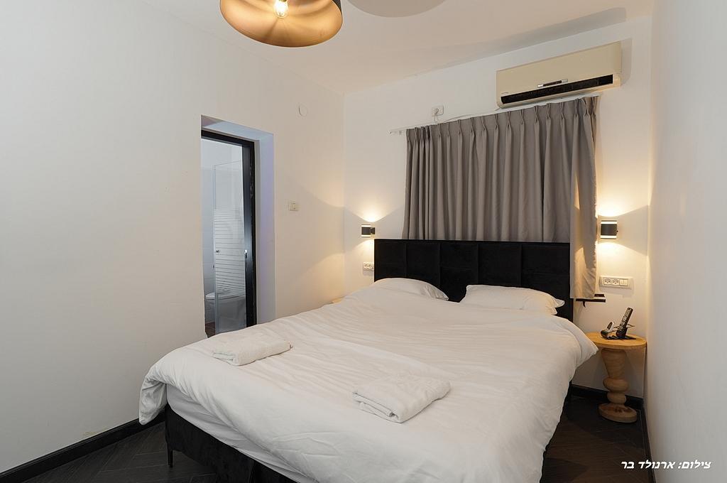 דון ליאון בוטיק צפון  41  נופש - וי פור ויקיישן - V for Vacation