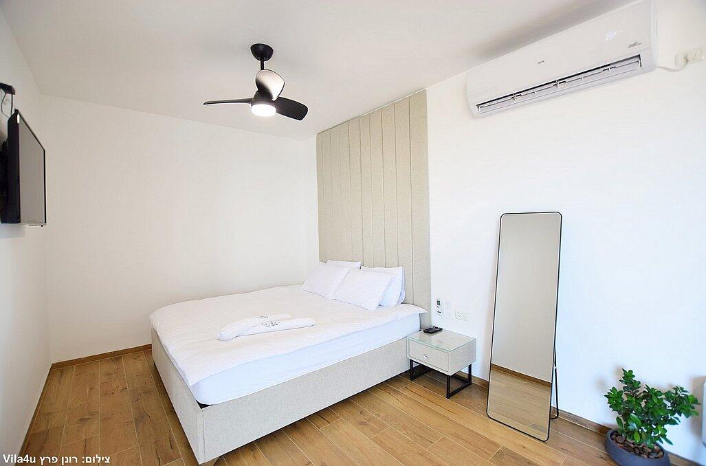 כינר סוויטות יוקרה צפון כינר סוויטות יוקרה - סוויטות עם מיטה זוגית כינר סוויטות יוקרה - סוויטות עם מיטה זוגית נופש - וי פור ויקיישן - V for Vacation