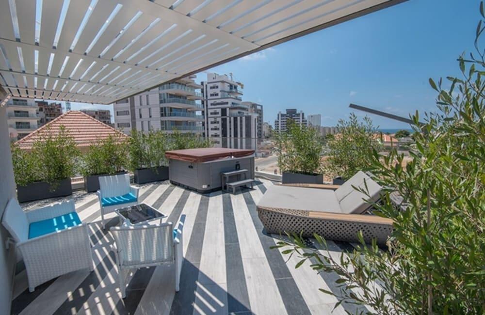 ארכיטקט ביץ האוס מרכז  32  נופש - וי פור ויקיישן - V for Vacation